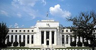 Fed maintains rates, sees three-time cut in 2024